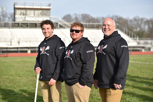 Coach Doug Sharp coaches with (from right to left) Doug Sharp – Head Coach, Tyler Hitsman – Offensive Coordinator, Liam Cunningham – Defensive Coordinator